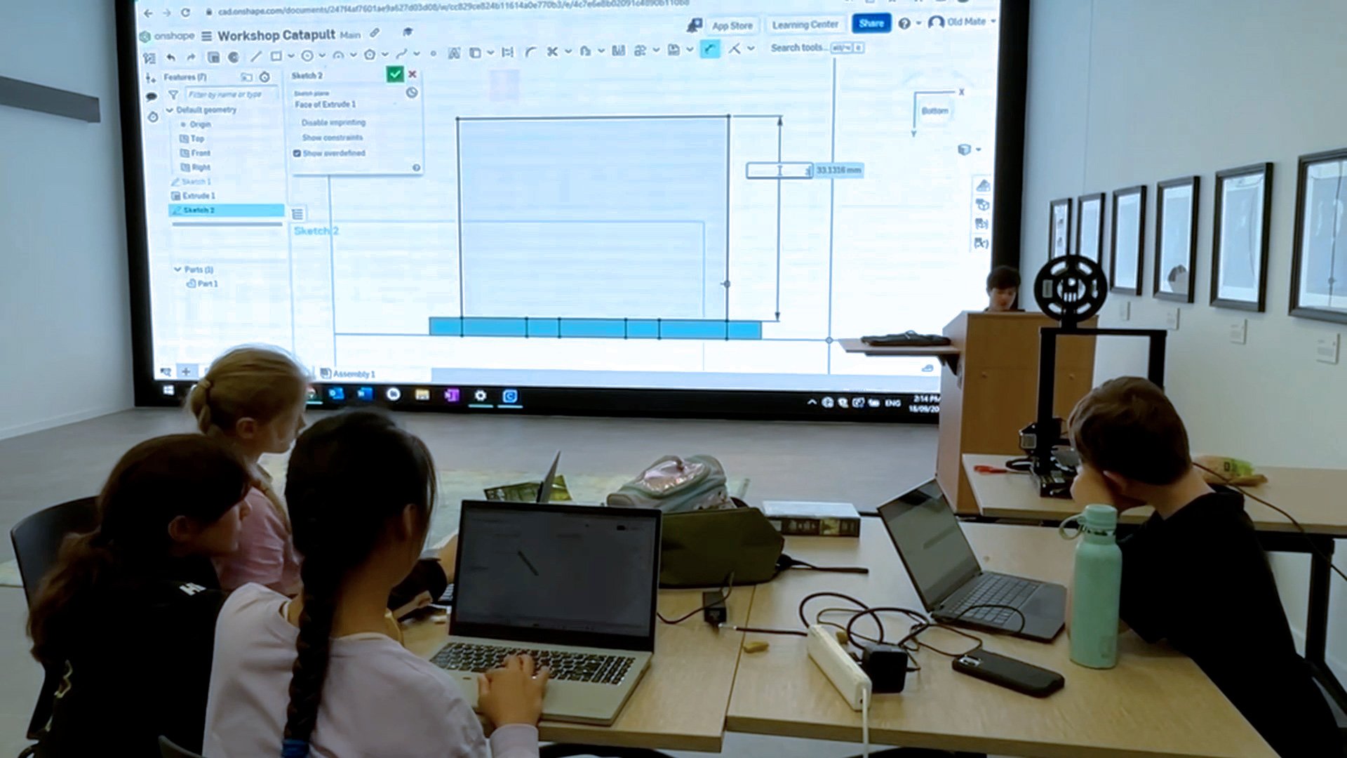 Students building projects at Inventors Club